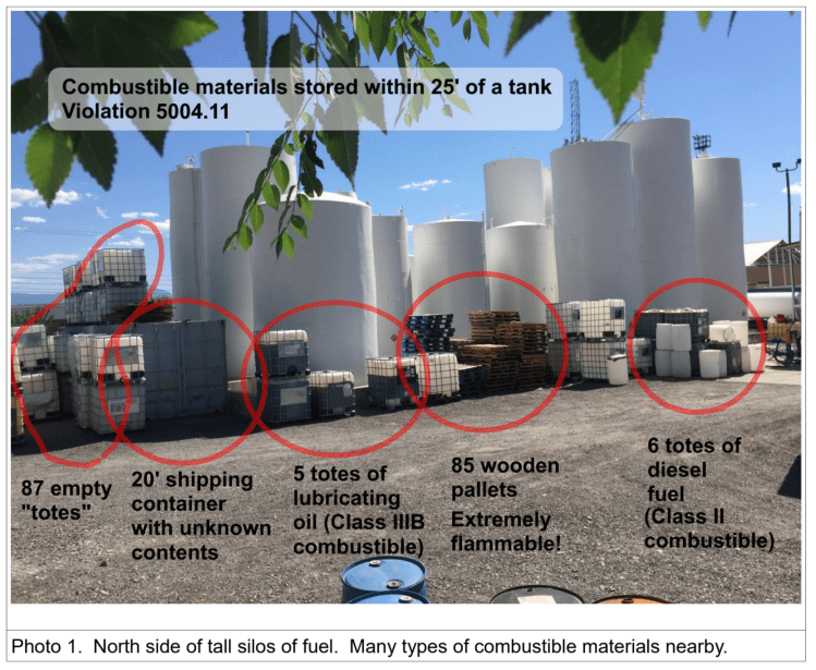 Christensen Oil stores combustible materials within 25' of a tank Provo Utah